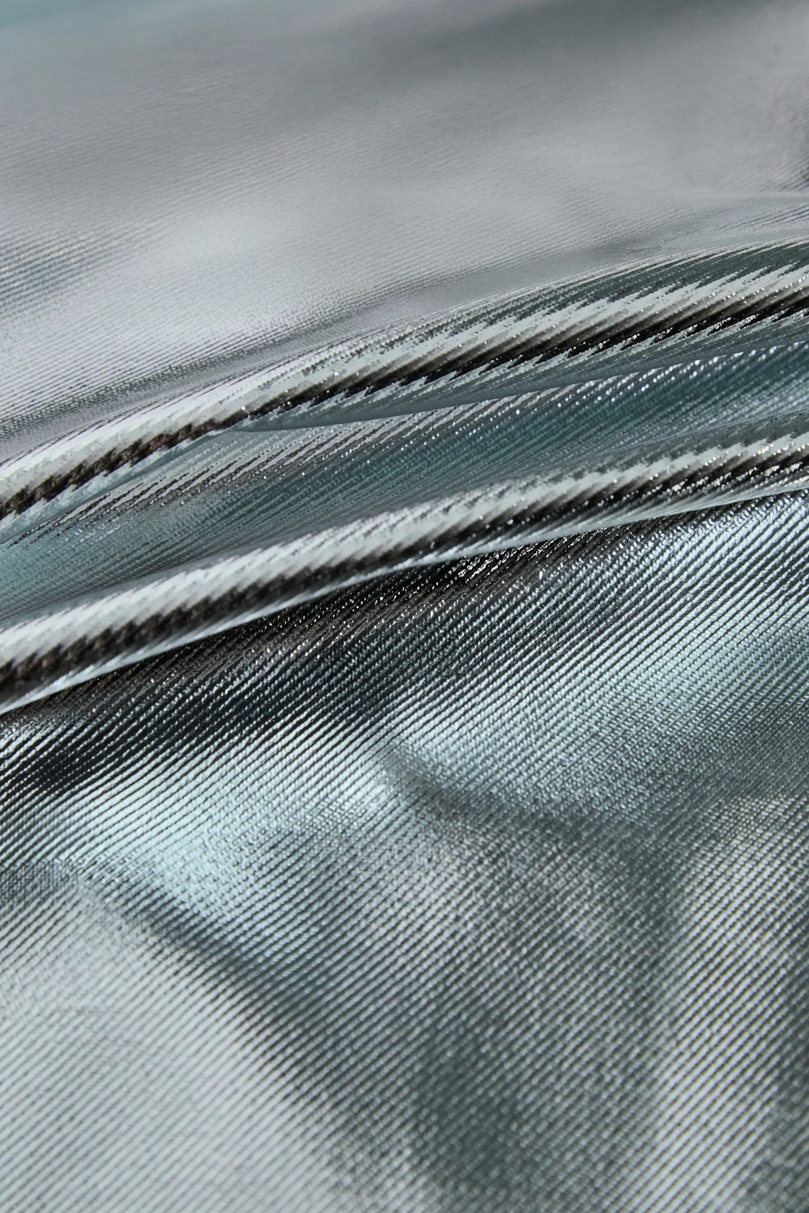 Close-up of aluminized PREOX fabric for steel and iron foundries